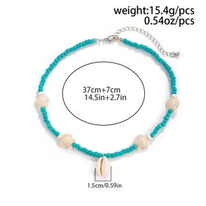 Detailed view of sea turtle beaded necklace with dimensions and natural shell pendant