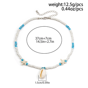 Detail showing white and blue beaded ocean necklace with starfish and conch pendants