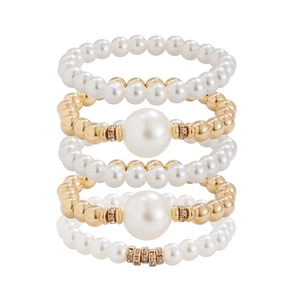 Set de 5 pulseras de perlas apilables con cuentas doradas y microcristales pavé
