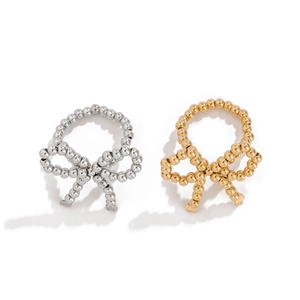 Polished gold and silver beaded bow rings for women featuring a minimalist metal ribbon style