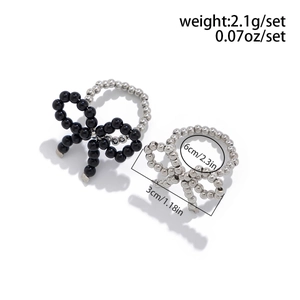 Detail view of bow beaded rings set with dimensions and weight 2.1g measurements