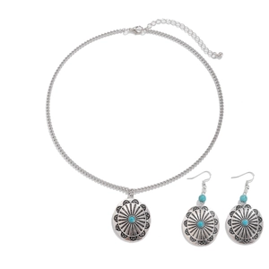 Böhmisches Schmuckset mit Türkis-Sonnenblumen-Halskette und Ohrringen auf weißem Hintergrund