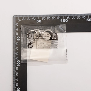 Detailed view of silver irregular lava rings set with ruler measurement for size reference
