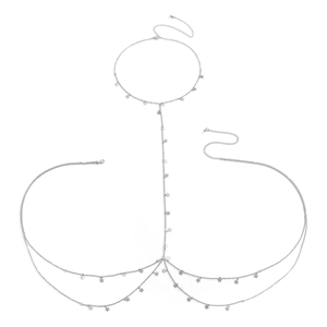 Close-up of silver layered body chain featuring delicate star pendants on a white background