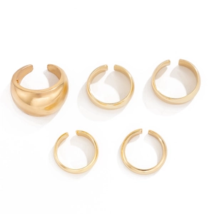 Detailed view of 5-piece gold lava texture minimalist open ring and ear cuff set