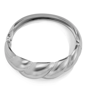 Close-up of silver wide water drop cuff bracelet with polished wavy mirror surface