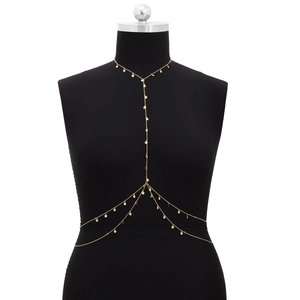 Sexy multi-layer gold star body chain jewelry for beach bikini outfits on black mannequin