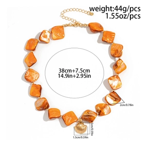 Detail of orange beaded necklace with gold shell pendant and dimension annotations