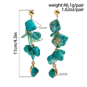 Detail view of long bohemian turquoise earrings with dimensions and weight specs