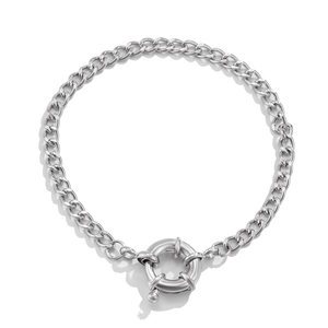 Detail of silver geometric punk bracelet with a large sailor clasp and flat Cuban links