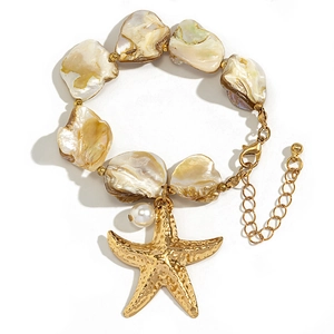Detailed close-up of shell bracelet with golden starfish charm and pearl accents