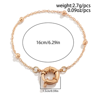 Detailed view of golden bead bracelet with spring ring clasp and 16cm circumference