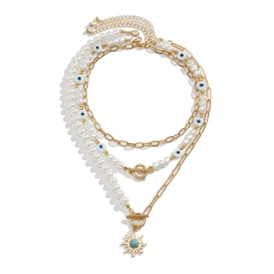 Mehrlagige Boho-Halskette mit Türkis-Sonnenanhänger, Perlen und blauem Auge-Perlenbesatz