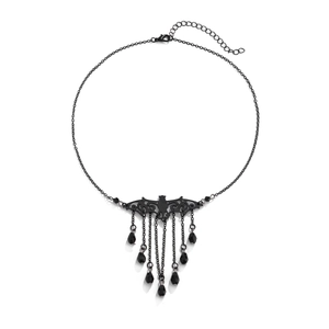 Gothic bat necklace detail with black tassel chains and teardrop beads on white background