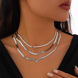 Three-layer silver snake bone chain necklace set with a V-shaped curve pendant detail