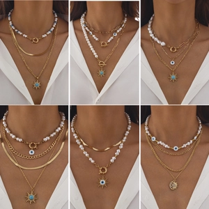Bohemian Vintage Mehrlagiges Halsketten Set Gold Legierung Sonne Mond Böser Blick Anhänger Künstliche Perle Choker Für Damen Schmuck