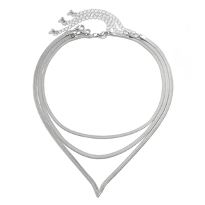 Detailed view of layered silver snake chain necklaces with V-shaped pendant design