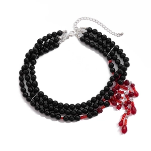 Detail of gothic choker with black beads, red crystal droplets and silver lobster clasp