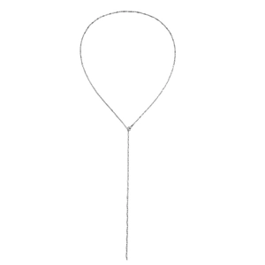 Macro detail of silver Y-shaped minimalist necklace with elegant long fringe tassel design