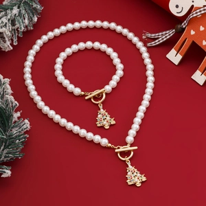 Halskette und Armband aus Perlen mit bunten Weihnachtsbaum-Anhängern und OT-Verschluss