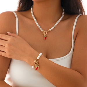 Perlenkette und Armband Set mit Weihnachtsglocken Anhänger und OT-Verschluss