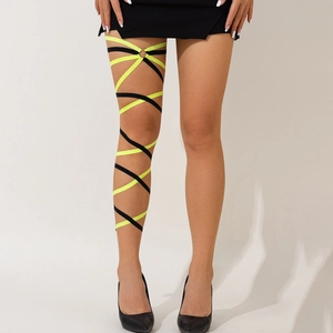 Detail of neon yellow and black elastic leg harness with metal ring on model