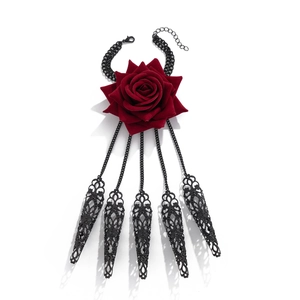 Detail of gothic rose hand chain with five linked rings and velvet flower design