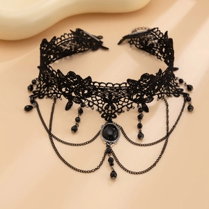 Detail of gothic black lace choker with vintage cross crystal beads and chain tassels