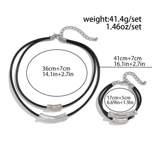 Detailed view of layered wax cord necklace set with irregular silver metal tubes and size specs
