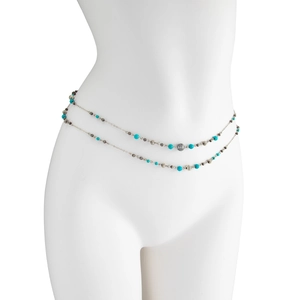 Detail of bohemian double-layer waist chain with blue beads and textured silver beads