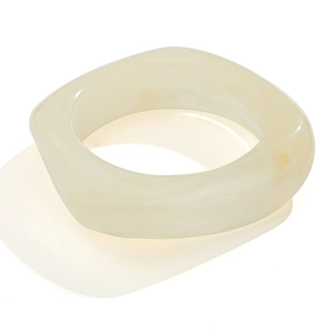 Modern creamy white acrylic wide bangle with marble texture and geometric square design