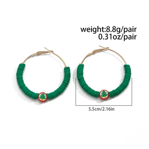 Detailed view of 5.5cm green clay bead Christmas hoop earrings with weight specifications