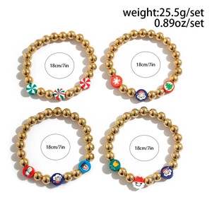 Close-up of 4-piece Christmas beaded bracelet set with snowman and elk charms