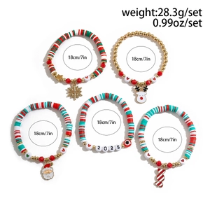 Detailed set of five Christmas beaded bracelets featuring 2025 charms and festive icons