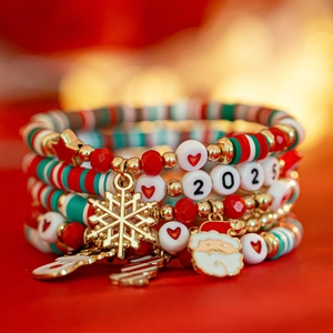 Detail of Christmas beaded bracelet set with snowflake charm and 2025 heart beads