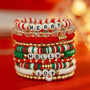 Handmade Christmas snowflake bead bracelet set with festive letter beads and heishi discs