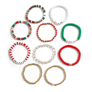 9-piece Christmas beaded bracelet set with snowflake charms and JOY MERRY HOLLY letters