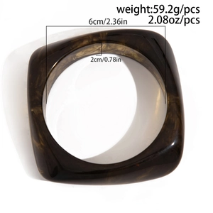 Deep amber tortoise shell chunky resin bracelet showing weight 59g and 6cm inner diameter