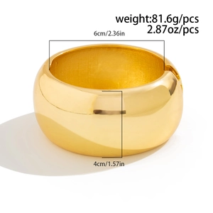 Polished gold wide metal bracelet dimensions showing 6cm inner diameter and 4cm width