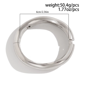 Detailed view of silver polished metal wide cuff bracelet with hinged clasp and measurements