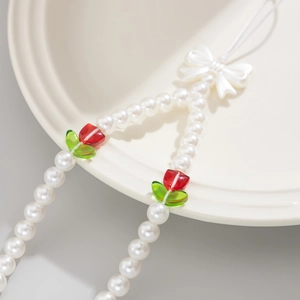 Beaded tulip and faux pearl phone charm with white bow for sweet aesthetic look
