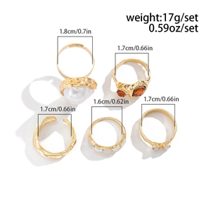 Detailed size chart showing inner diameters of five gold flower and pearl rings set