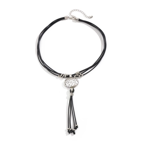 Ethnic retro necklace with black braided cord and silver oval pendant with fringe detail