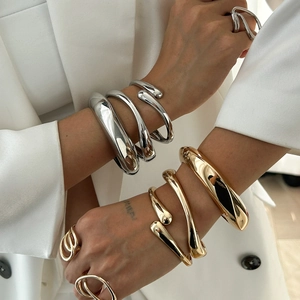 Minimalist liquid-style irregular alloy spring bracelet and ring jewelry set in gold and silver