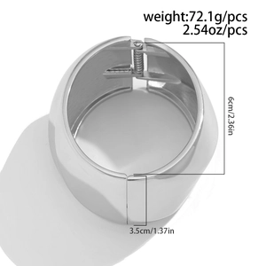 Detail view of silver spring cuff bracelet showing dimensions of 6cm inner diameter