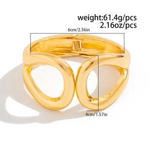 Detail of gold hollow chunky bangle showing 6cm width and 61.4g weight measurements