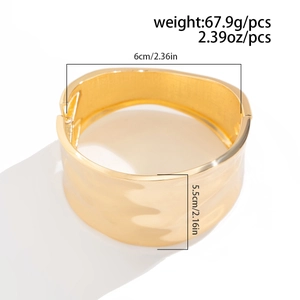 Detail showing dimensions of golden liquid metal textured cuff bracelet with hammered surface