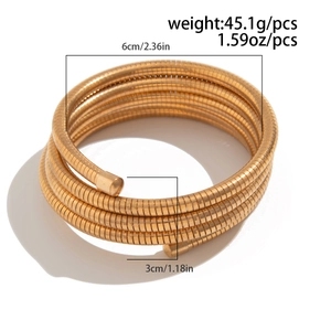 Detail of gold multi-layer spiral bracelet showing weight and dimension specifications