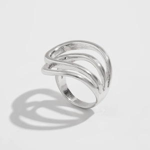 Macro shot of silver wave multi-layer hollow ring with a high-polished finish