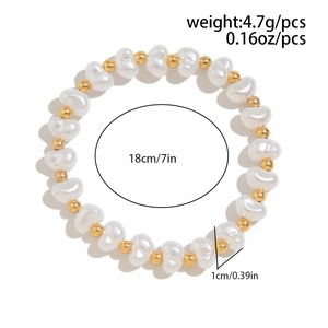 Detail showing white heart-shaped pearl beads and gold metal beads with weight and size info